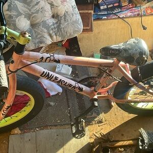 Unleared BMX Bike with Yellow and Pink Accents